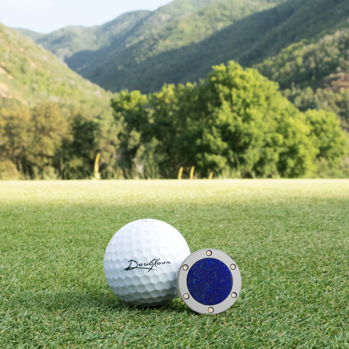 The Celestia Golf Ball Marker — alternate angle showing diamond finish