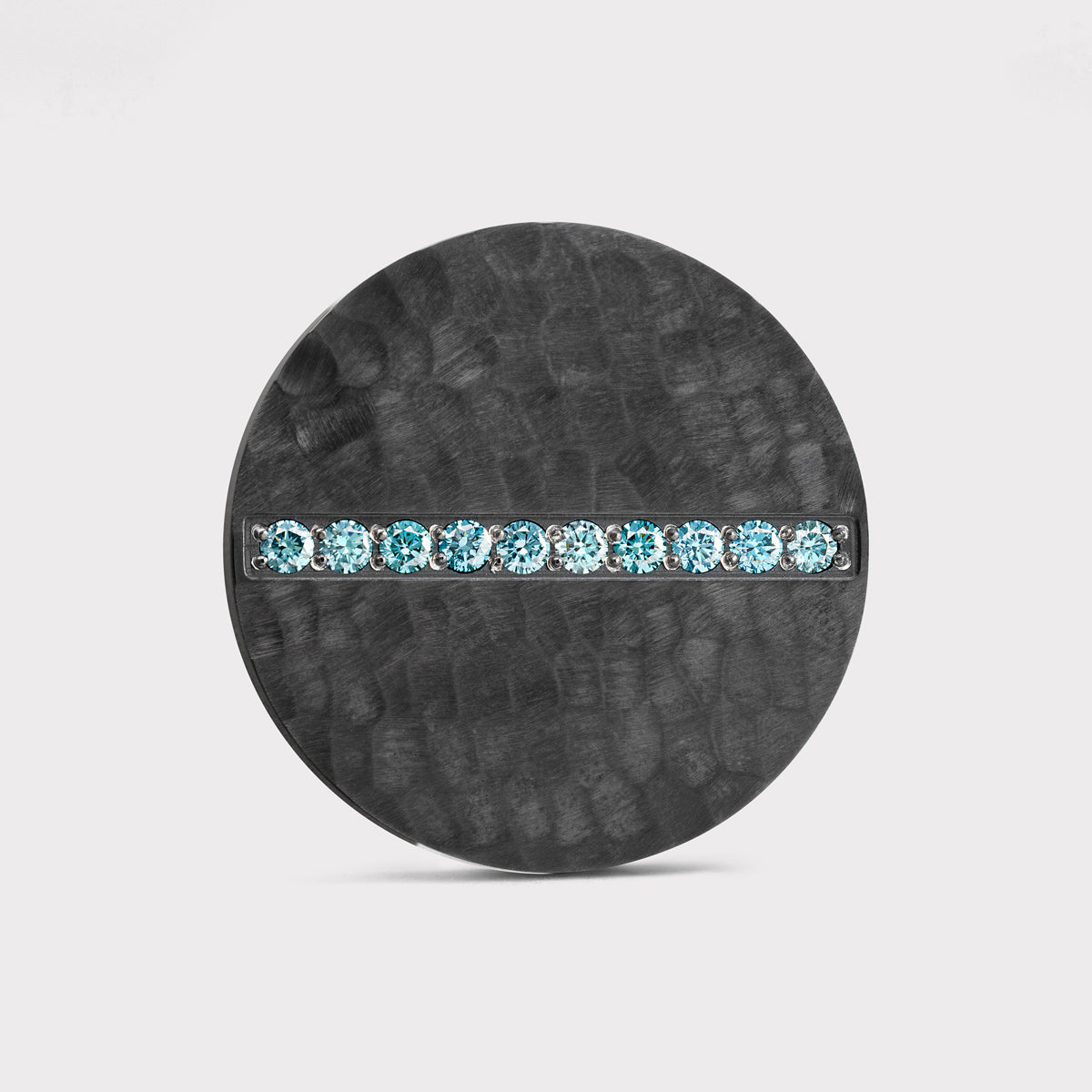 The Queen's Revenge Golf Ball Marker — scale comparison showing 30mm diameter