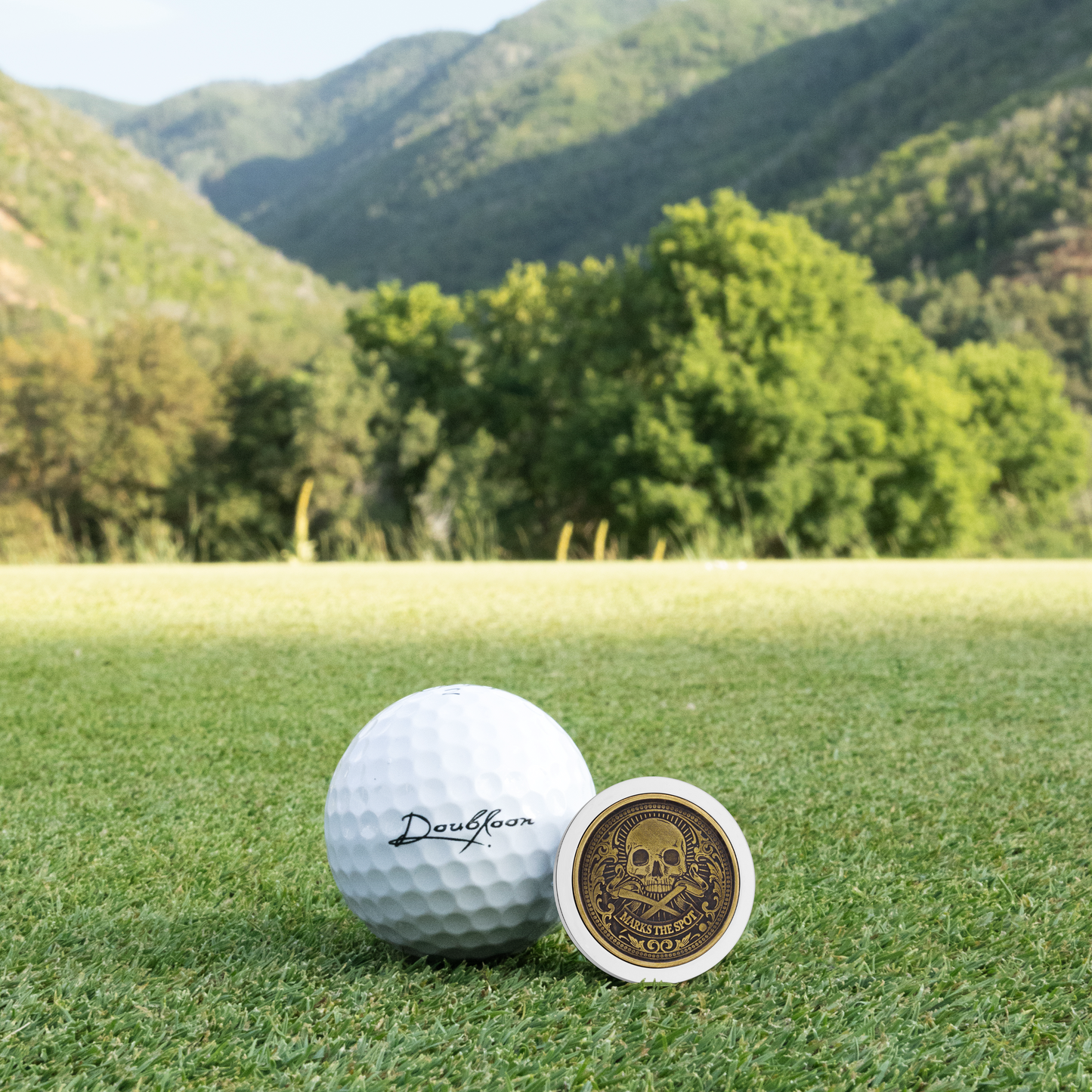 The Omen IV Antique Golf Ball Marker — alternate angle showing sterling silver and tungsten finish