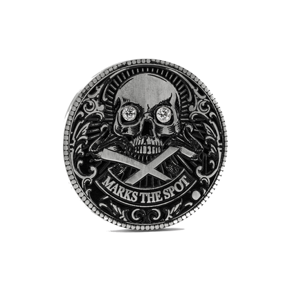 Decorative custom golf ball marker with skull design, diamonds in the eyes and 'X Marks the Spot' text on a white background