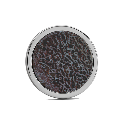 The Raptor Premier Golf Ball Marker — hero view showcasing fossilized cell structure