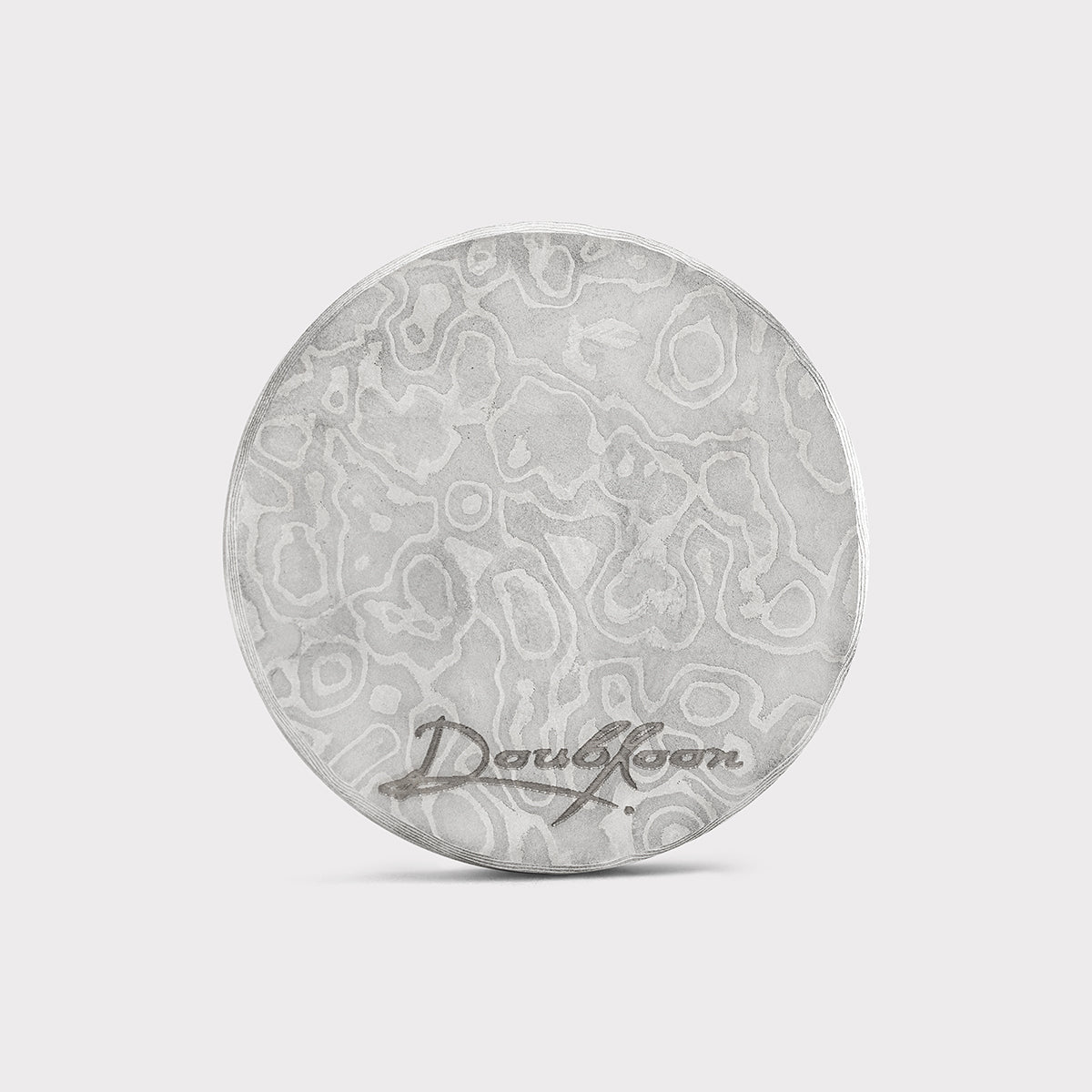 The Voodoo Golf Ball Marker — back view showing precision tungsten weight