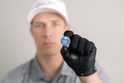 The Silver Omen Antique, Color Edition Golf Ball Marker — professional photograph showing diamond and sterling silver finish