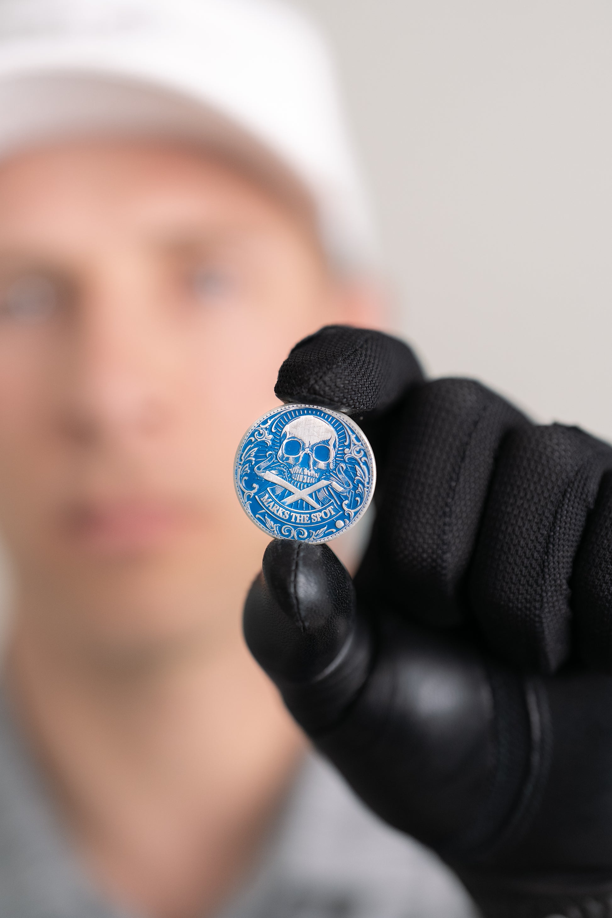 The Silver Omen Antique, Color Edition Golf Ball Marker — professional photograph showing diamond and sterling silver finish